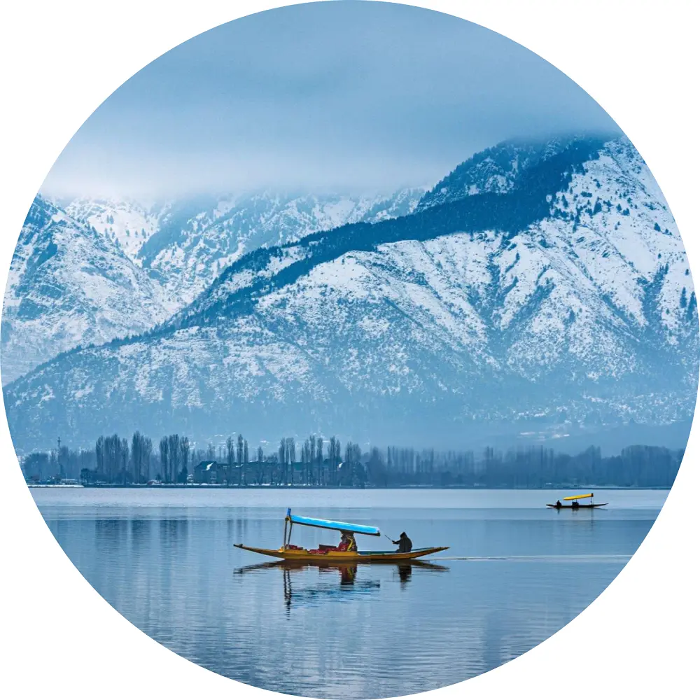 a group of boats floating on top of a dal lake
